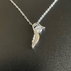 White crystal angel wing necklace